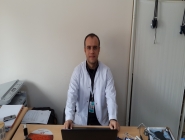 Dr. Tahsin TMUR